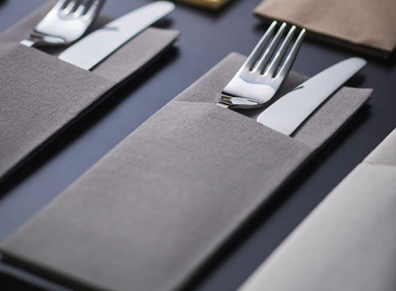 Convenient grey napkin pocket preloaded with cutlery