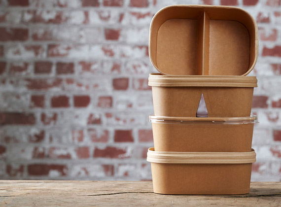 Cardboard takeaway boxes stacked on top of each other.
